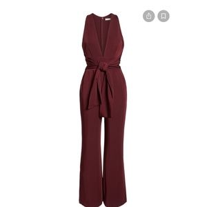 RED BURGUNDY JUMPSUIT WITH PLUNGE NECKLINE